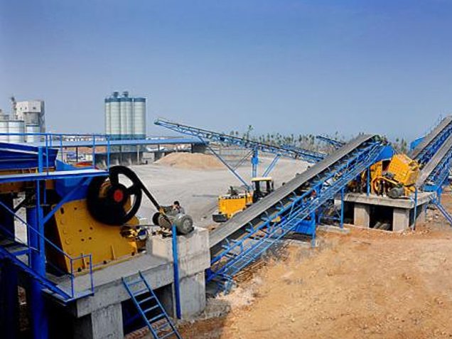 A blue gravel production line is paired with a yellow crusher.